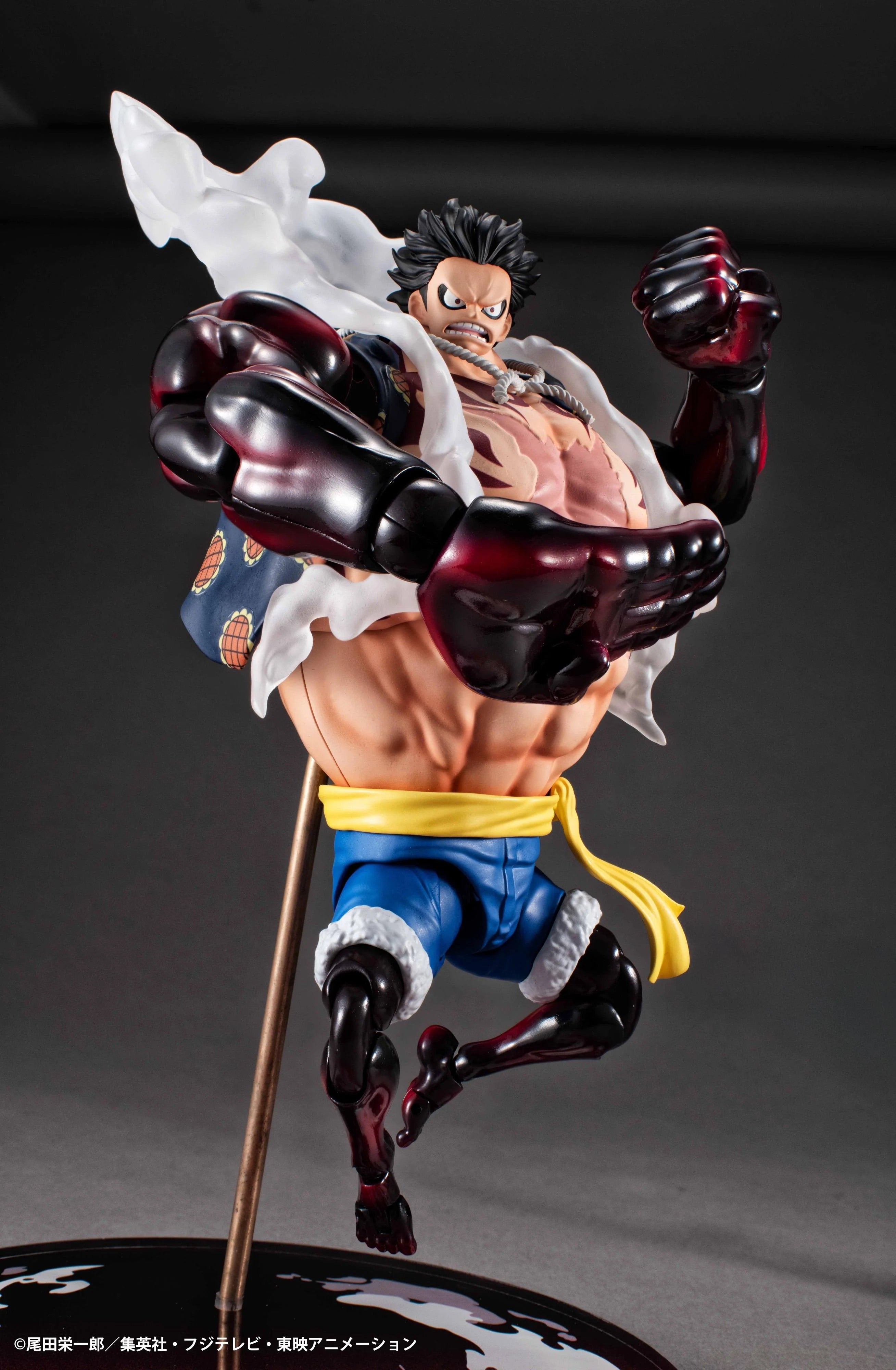 An angled front view of the Luffy Gear 4 Boundman figure, posed dynamically with a large, armored fist ready to punch.