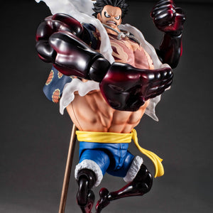 An angled front view of the Luffy Gear 4 Boundman figure, posed dynamically with a large, armored fist ready to punch.
