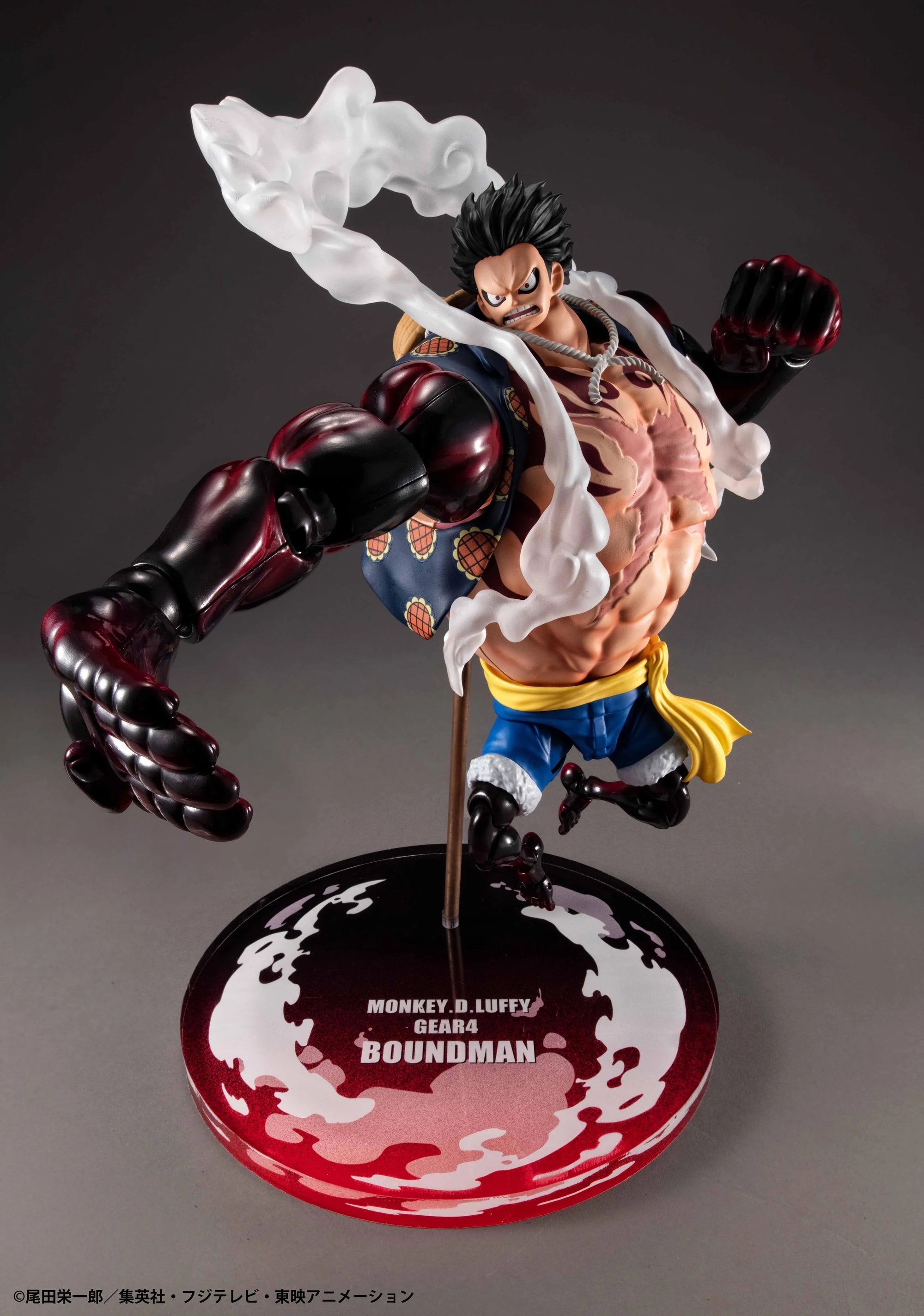 Luffy Gear 4 Boundman figure in a fierce leaping pose, with one leg extended and the white steam effect parts flowing.