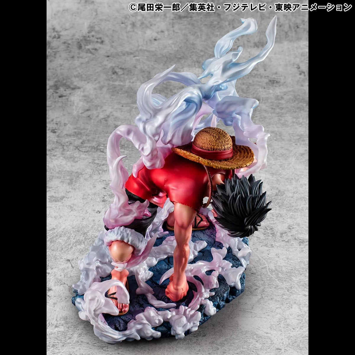 Rear view of the Luffy Gear 2 figure, focusing on his straw hat and the swirling steam effects rising from his body.