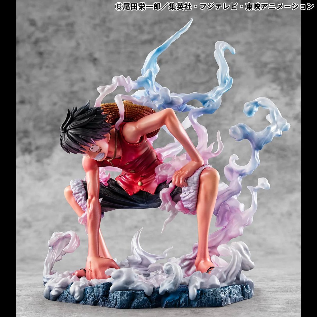 Side angle of the Luffy Gear 2 figure, demonstrating the tension in his limbs and the flow of the steam effect pieces.