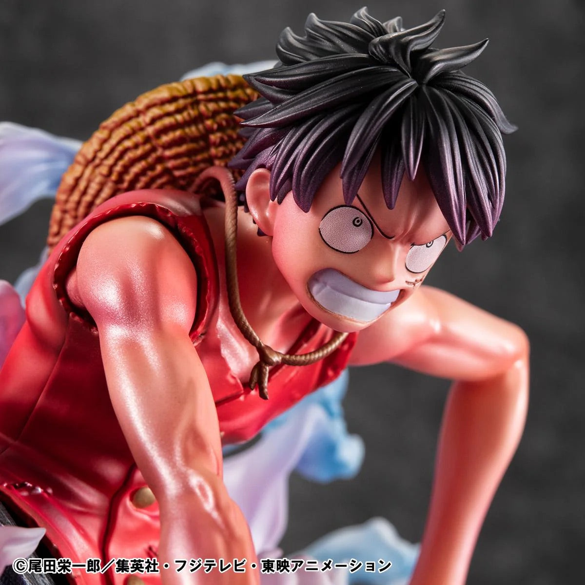 Close-up of the Luffy Gear 2 figure's face and upper body, highlighting his intense, grimacing expression and veins pulsing.