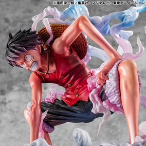 A close-up side view of the Luffy Gear 2 figure's torso and leg, highlighting the muscle definition and steam wrapping around his knee.