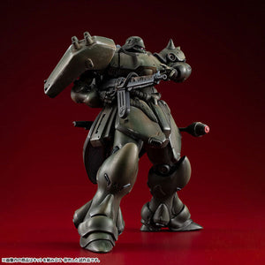 Front three-quarter standing view of the painted Mobile Suit Gundam VAKIT Geara Doga Standard Type plastic model kit holding its rifle across its chest.