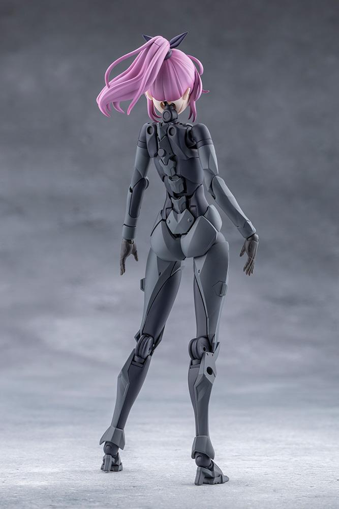 Rear standing view of the Megalomaria Emulator figure showing spine articulation and mechanical joints.
