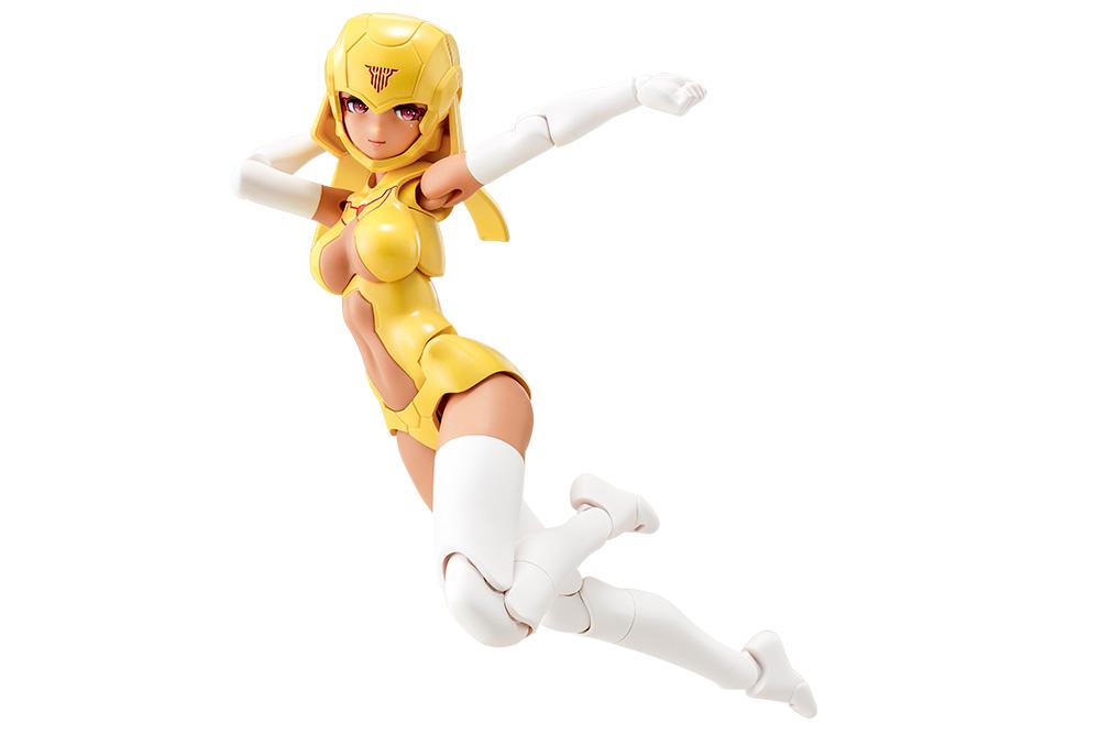 Dynamic flying action pose of the Kotobukiya Megami Device B1R-L Chassis Kit Skin Color E model kit in yellow concept armor on a white background.