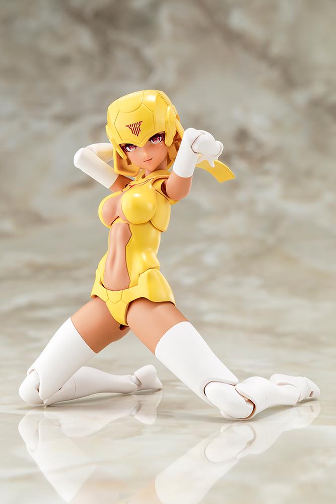 High articulation display showing the Megami Device B1R-L Chassis Kit Skin Color E model kit in a flexible kneeling pose.