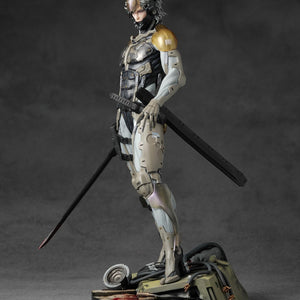 Side view of Raiden statue showing high-frequency blade and mechanical exoskeleton detail.