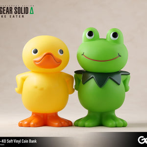 Side-by-side view of the GA-KO yellow duck and Kerotan green frog soft vinyl coin banks.