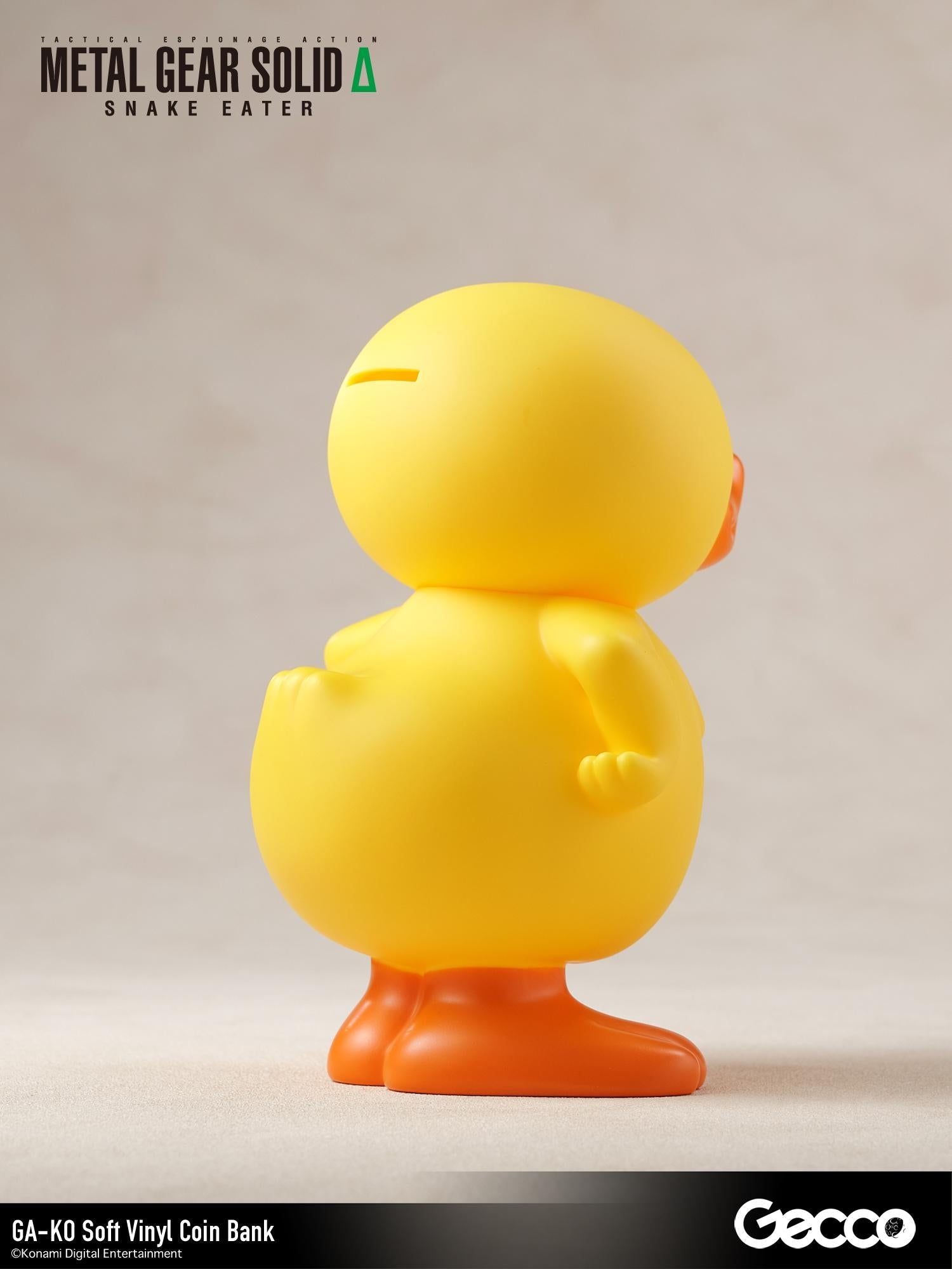 Rear right-side perspective of the GA-KO vinyl coin bank figure.