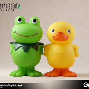 Side-by-side view of the Kerotan green frog and GA-KO yellow duck soft vinyl coin banks.