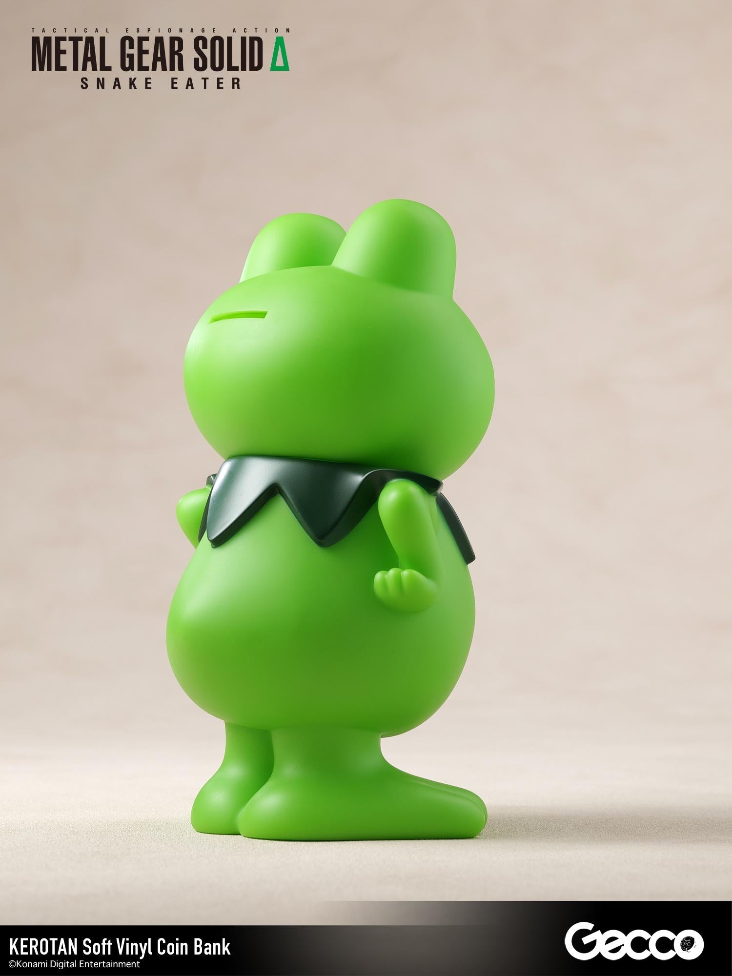 Rear right-side perspective of the green Kerotan vinyl coin bank figure.