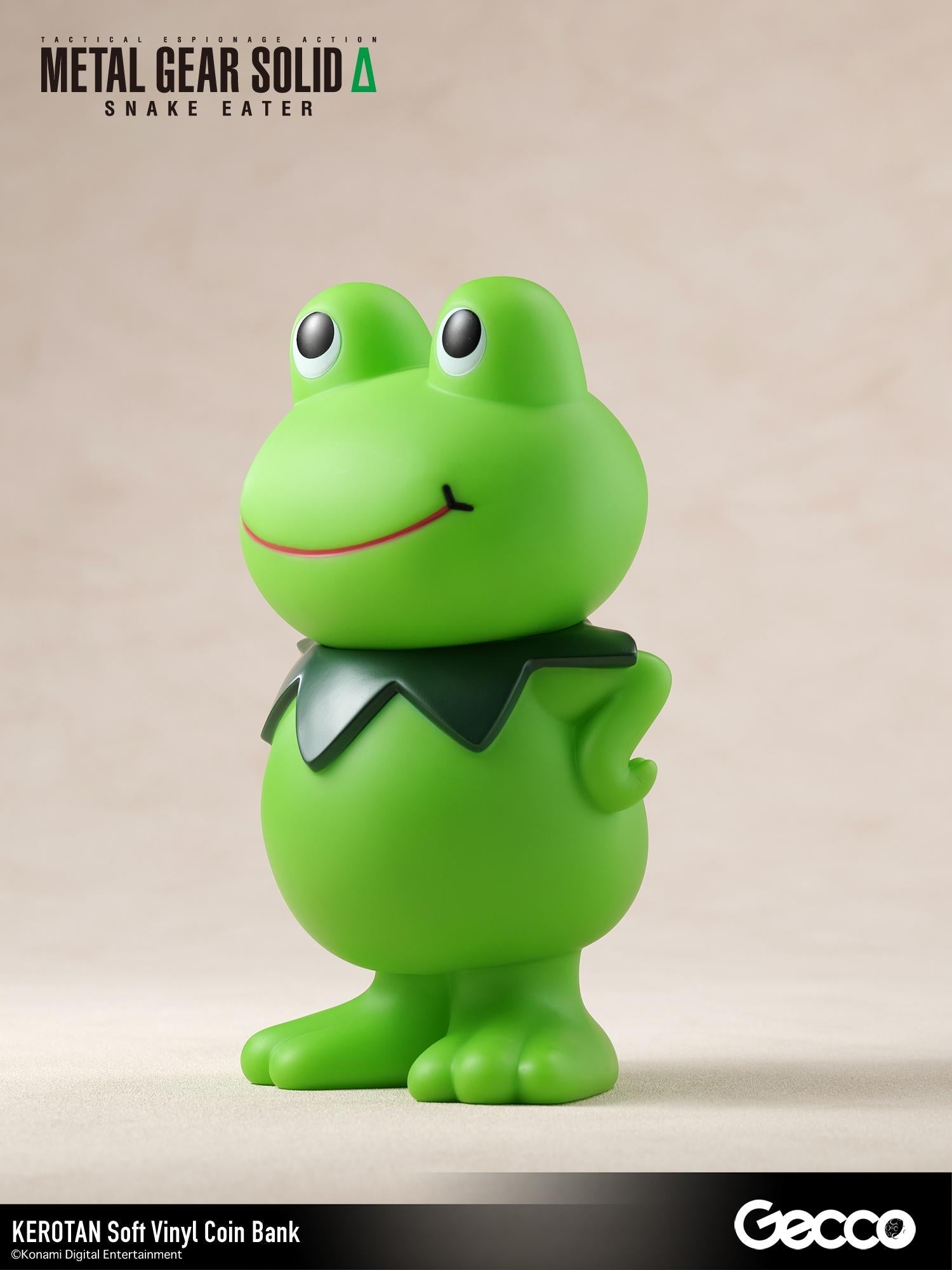 Three-quarter front-right view of the green Kerotan soft vinyl coin bank from Metal Gear Solid Delta Snake Eater.