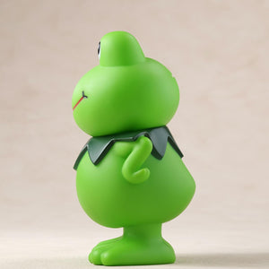 Left side profile view of the Kerotan soft vinyl frog coin bank by Gecco.