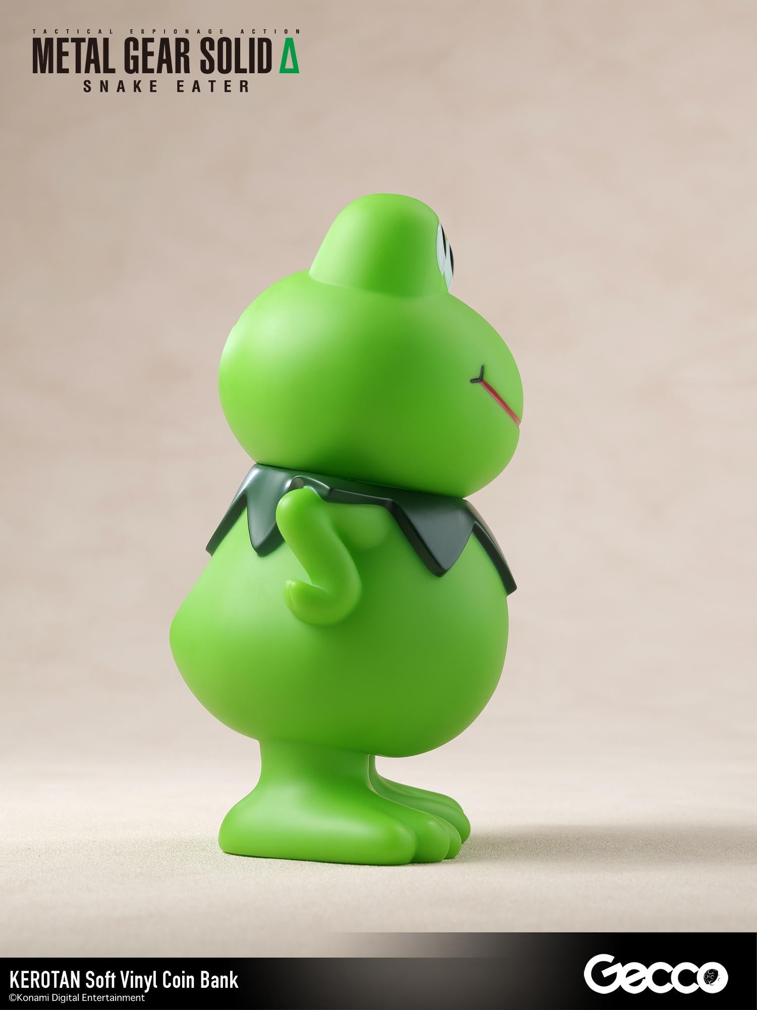 Right side profile view of the Kerotan green frog soft vinyl coin bank.