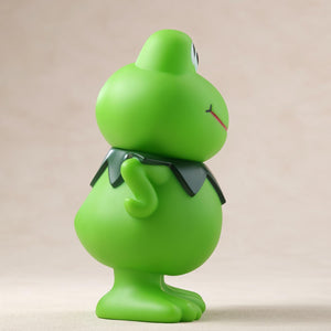 Right side profile view of the Kerotan green frog soft vinyl coin bank.