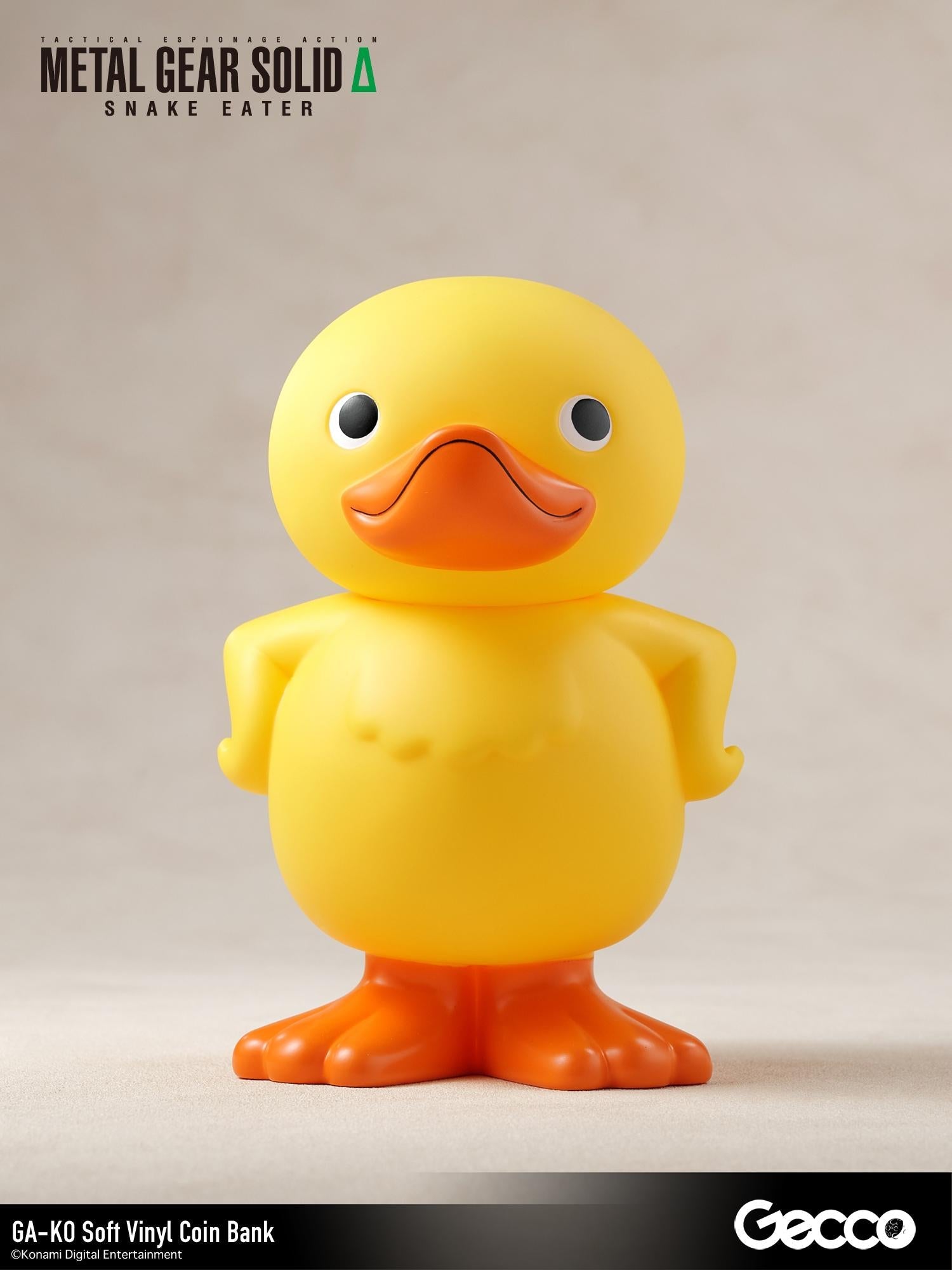 Front view of the Gecco Metal Gear Solid Delta Snake Eater GA-KO soft vinyl yellow duck coin bank figure.