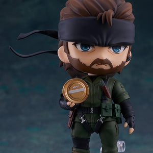 Naked Snake Nendoroid figure holding a ration tin accessory from the Snake Eater game.