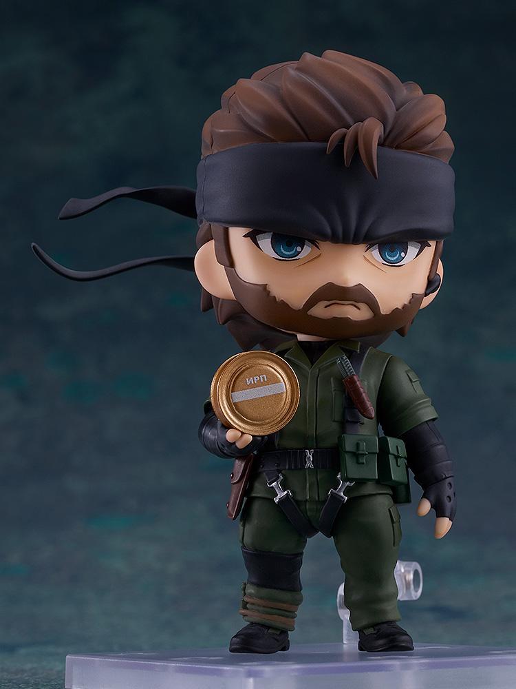 Naked Snake Nendoroid figure holding a ration tin accessory from the Snake Eater game.