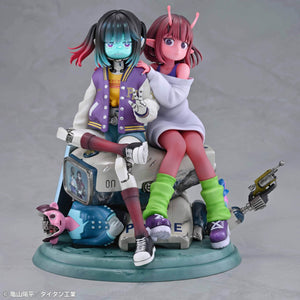 Full front view of the Medicos Milky Subway The Galactic Limited Express Chiharu and Makina figure sitting together on a detailed police car vehicle base.