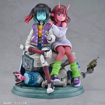 Full front view of the Medicos Milky Subway The Galactic Limited Express Chiharu and Makina figure sitting together on a detailed police car vehicle base.