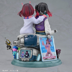 Rear view of Chiharu hugging Makina's purple letterman jacket, displaying the retro anime poster accessory attached to the base.