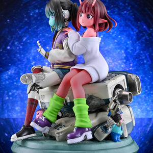 Right side view of the Chiharu and Makina figure displayed against a blue space galaxy background.