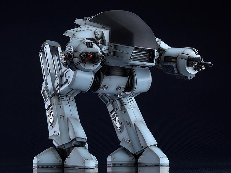 Side-profile of the ED-209 model kit showcasing the articulated leg joints, pistons, and slide rails for stable posing.