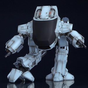 Full front-facing view of the ED-209 plastic model kit against a dark background, showcasing its wide combat stance.