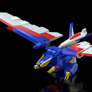 The Mach Eagle mecha from the MODEROID Ganbaruger plastic model kit transformed into its blue robotic eagle Animal Mode with wings spread.