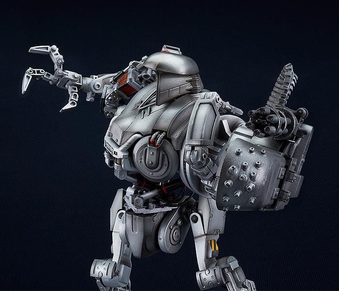Close-up of RoboCain's heavy Gatling gun arm and secondary manipulator claw in a battle-ready pose.
