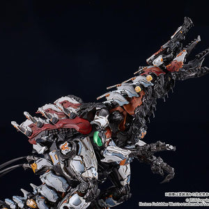 Action pose of the Slaughterspine model kit looking upward, highlighting the drawer joints in the neck and the pre-assembled ratchet joints in the hips.