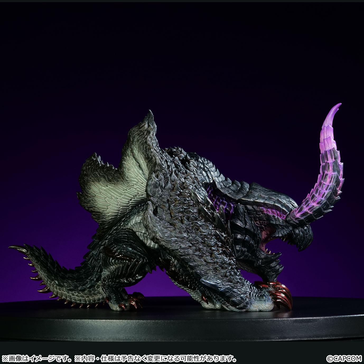Side profile view of the non-articulated Gore Magala vinyl figure showcasing scale texturing and purple antennae.
