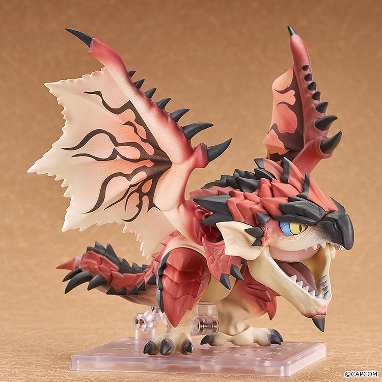 Front three-quarter view of the Rathalos Nendoroid figure standing on a square clear display base.