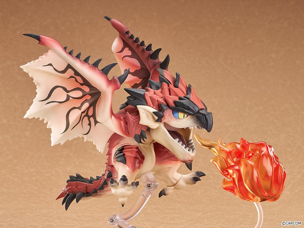 Rathalos Nendoroid figure in a flying pose releasing a translucent red and orange fireball effect part.