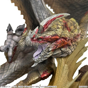 Detailed close-up shot of the roaring head sculpt of the Seregios figure featuring red-accented scales and sharp teeth.