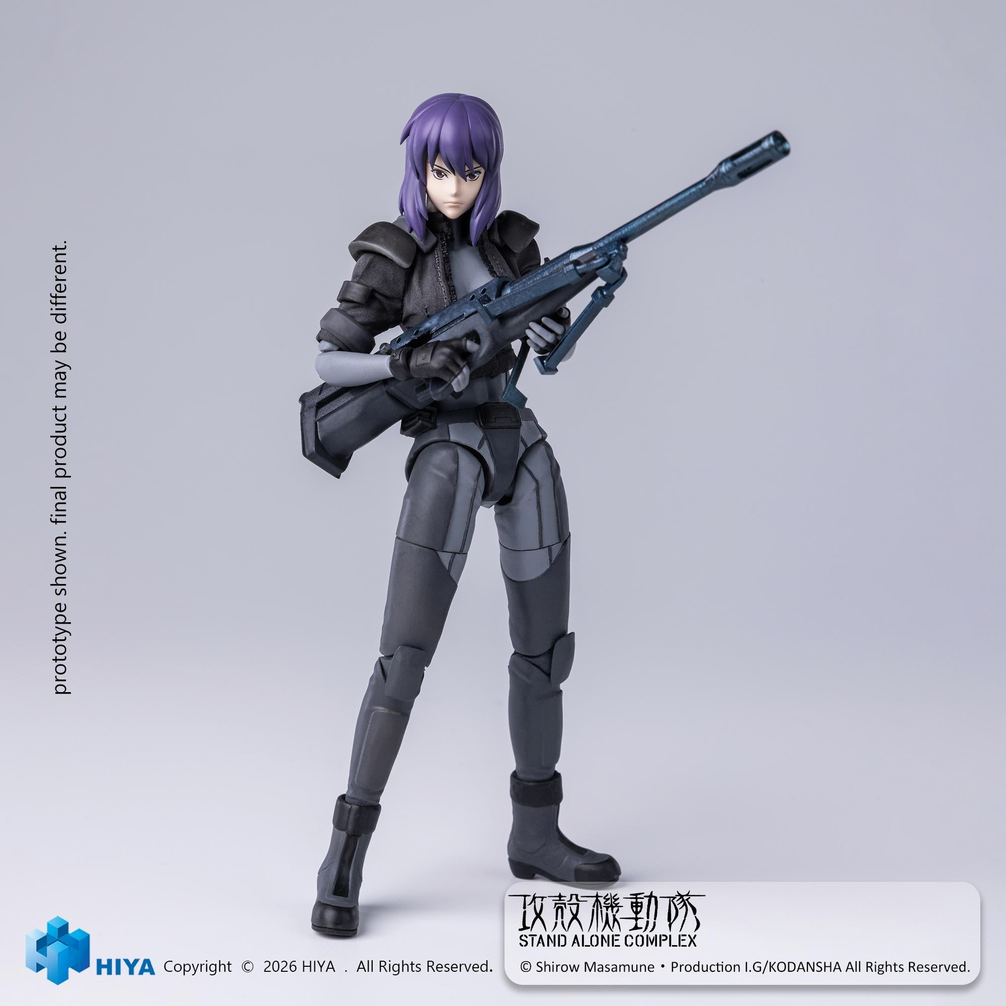 Full-body front studio shot of Motoko Kusanagi holding a heavy anti-tank rifle with both hands.
