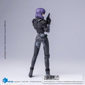Rear view of the Ghost in the Shell Motoko Kusanagi action figure looking over her shoulder with a handgun raised.