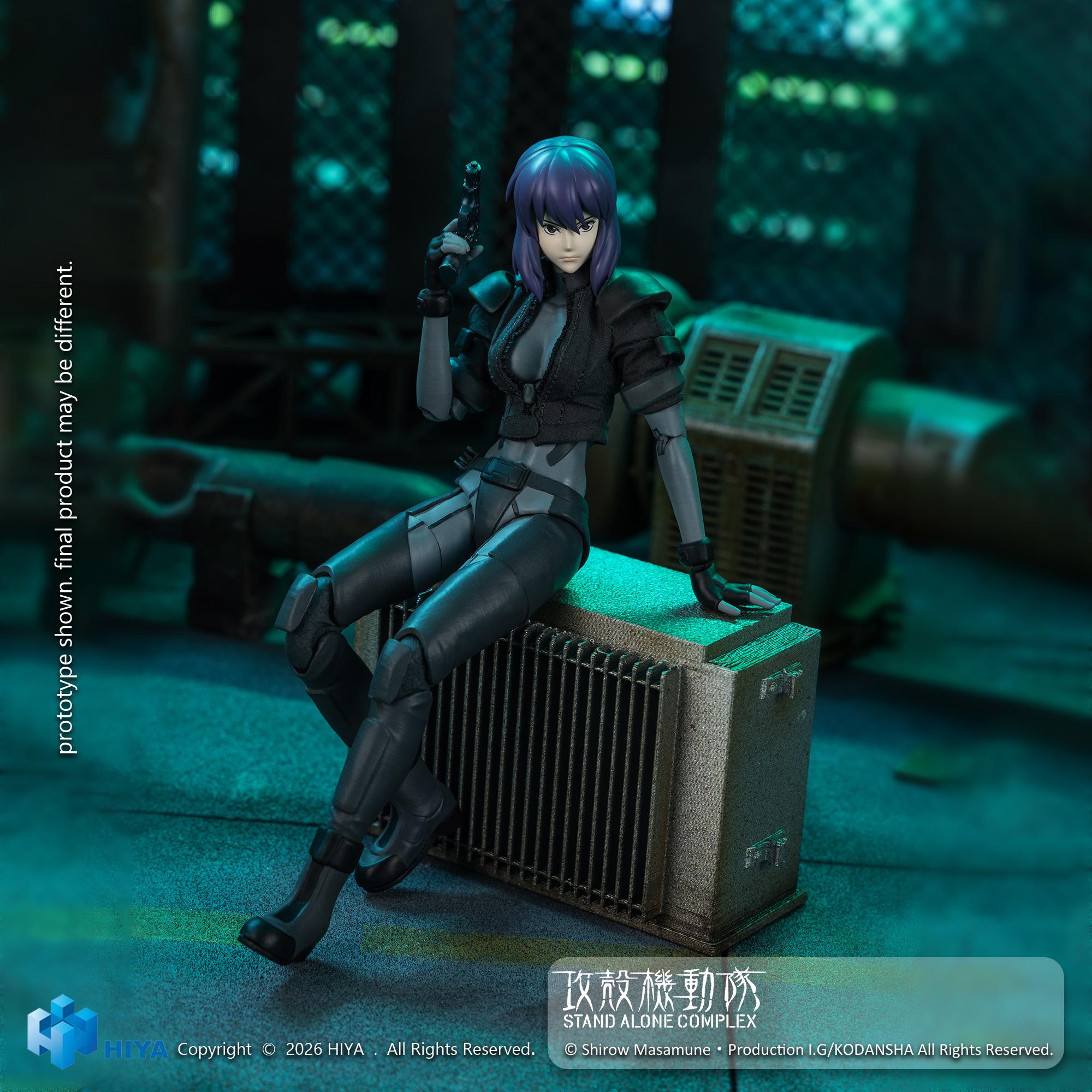 Ghost in the Shell Motoko Kusanagi action figure seated on a metallic industrial unit holding a handgun.