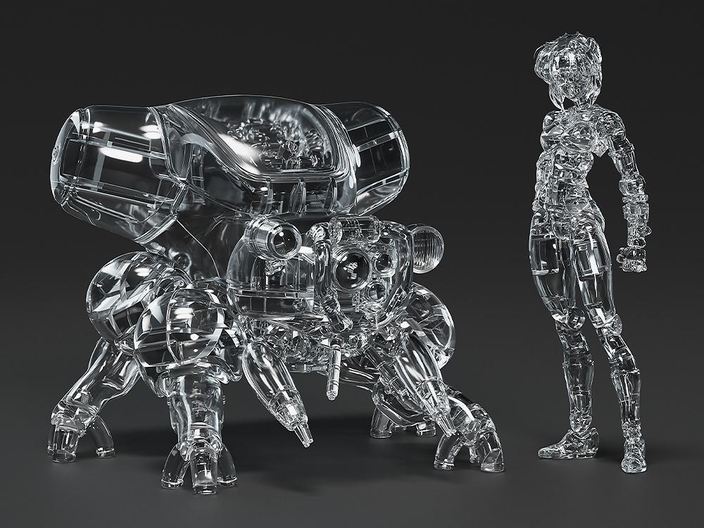 Studio product shot of the clear plastic Ghost in the Shell PLAMAX Motoko Kusanagi and Fuchikoma thermoptic camouflage version model kit, dark gray background.
