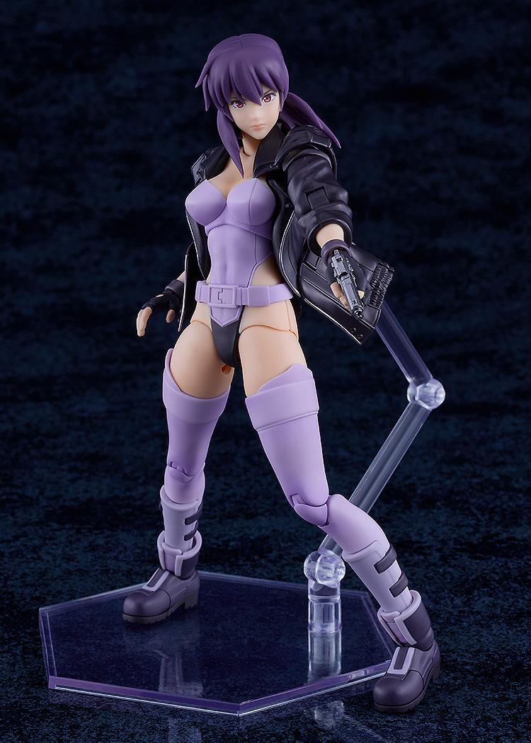Motoko Kusanagi figure in a wide stance firing her Seburo pistol, showcasing the realistic proportions of the PLAMATEA line.