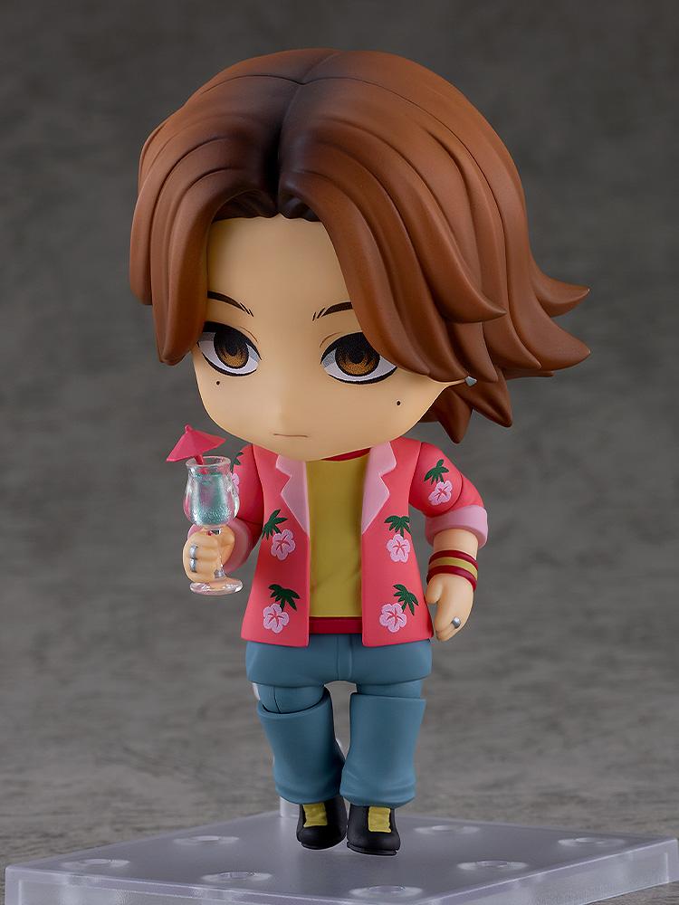 Mouthwashing Daisuke Nendoroid figure holding an umbrella cocktail glass accessory with a serious expression.
