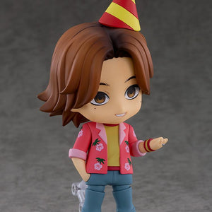 Daisuke Nendoroid figure from Mouthwashing wearing a red and yellow striped party hat with hand gesturing.