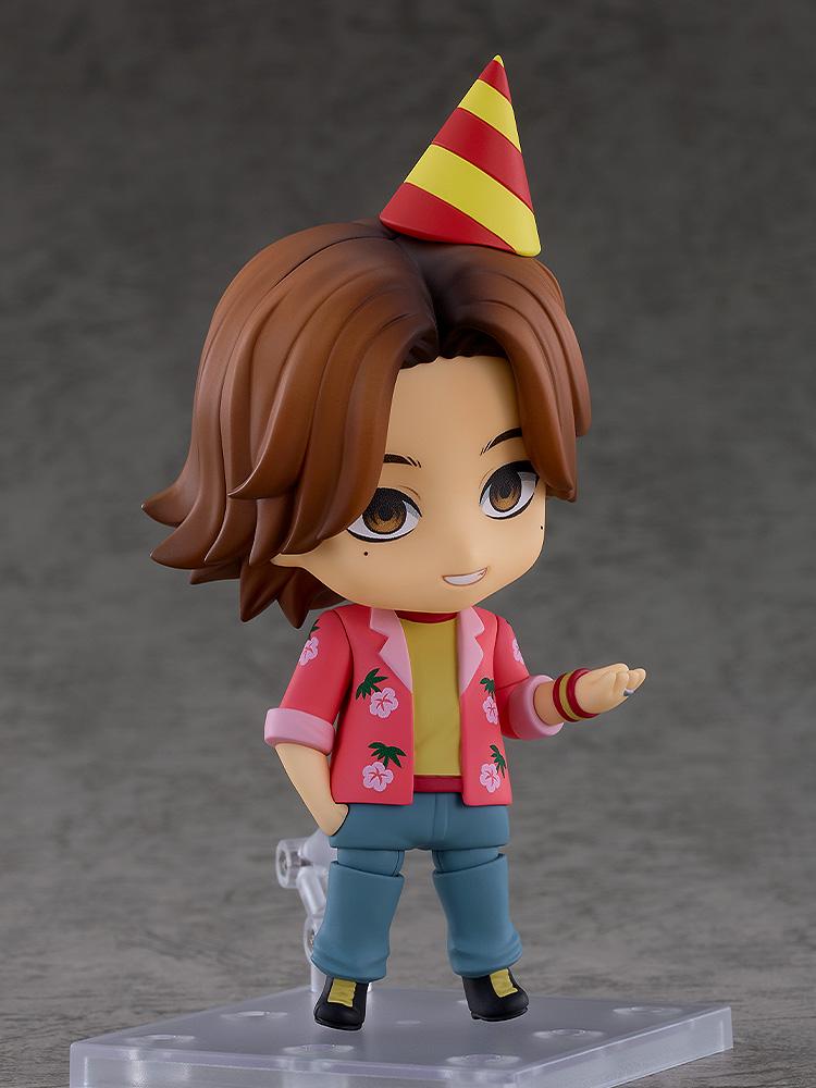 Daisuke Nendoroid figure from Mouthwashing wearing a red and yellow striped party hat with hand gesturing.