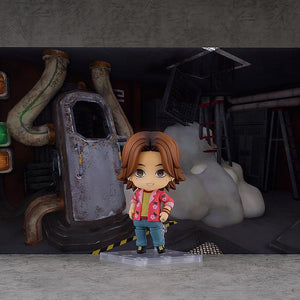 Daisuke Nendoroid figure displayed with the included utility room background paperboard diorama.