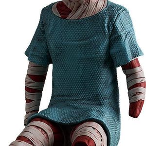 Isolated studio cutout of the Mouthwashing POP UP PARADE Swacchao! Curly figure sitting, featuring head bandages, a single exposed eye, and a blue hospital gown.