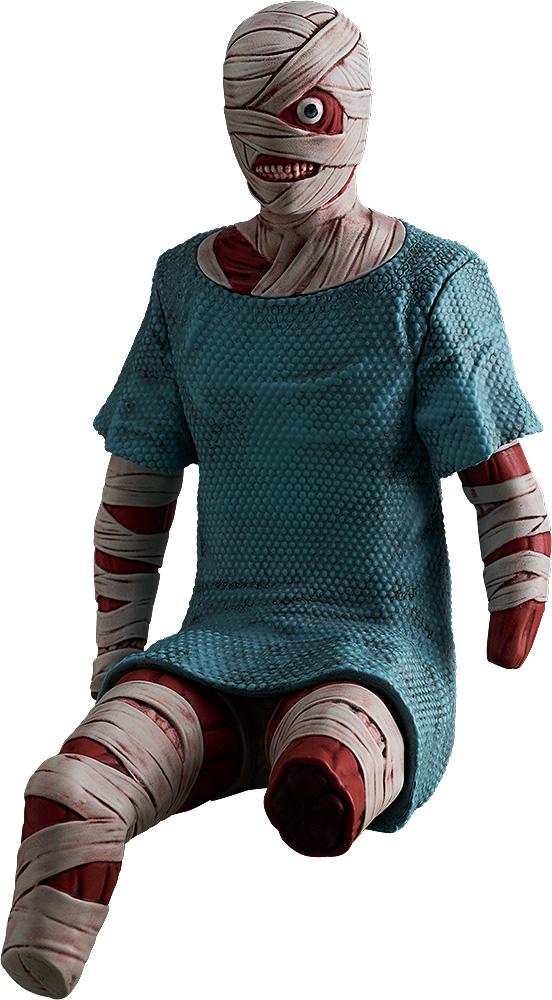 Isolated studio cutout of the Mouthwashing POP UP PARADE Swacchao! Curly figure sitting, featuring head bandages, a single exposed eye, and a blue hospital gown.
