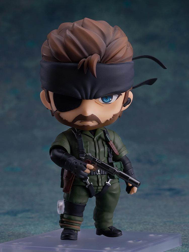 Close-up of Naked Snake Nendoroid figure in a close-quarters combat pose with tactical gear detail.