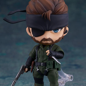 Naked Snake Nendoroid in a tactical stance holding a suppressed handgun and CQC knife.