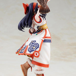 Left side view of Nakoruru figure looking upward toward her hawk Mamahaha perched on her arm